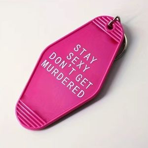 NWT SSDGM Stay Sexy Don’t Get Murdered pink keychain vintage hotel style new